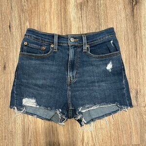 Levi’s Blue Jean Shorts with Distressed Hem and Cut-Off Style